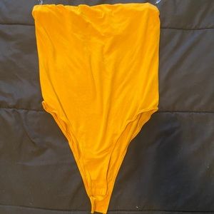 Yellow bodysuit